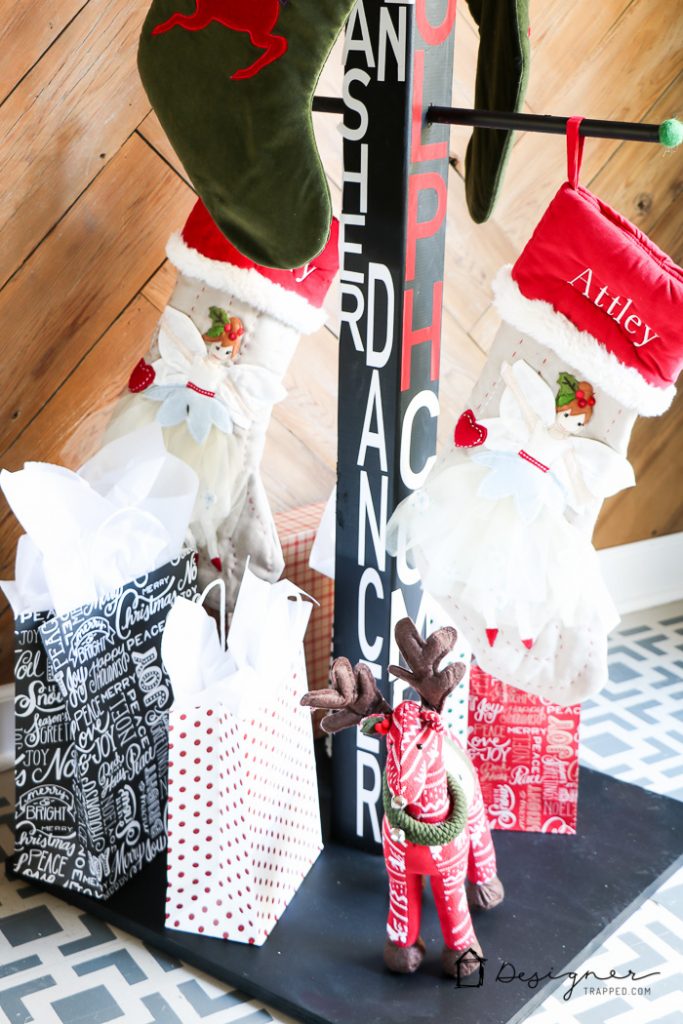 No mantel? No problem. You can hang Christmas stockings without a mantel. This DIY stocking holder stand is the perfect solution and this full tutorial makes it look so easy. #DIYworkshop #sponsored