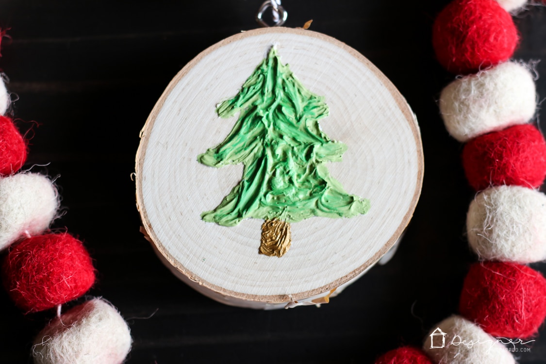 If you've ever wondered how to make Christmas ornaments that are unique and easy, this is the tutorial for you! I love how much texture the Christmas tree has--I never would have thought to use caulk!