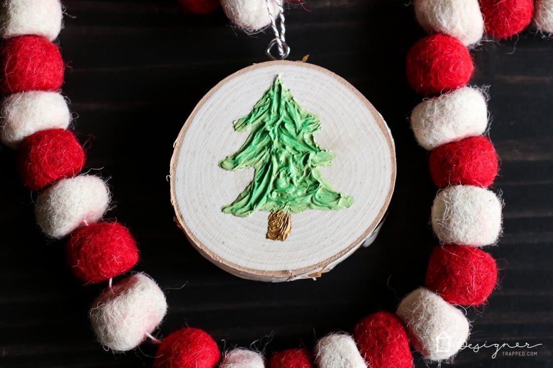 If you've ever wondered how to make Christmas ornaments that are unique and easy, this is the tutorial for you! I love how much texture the Christmas tree has--I never would have thought to use caulk!