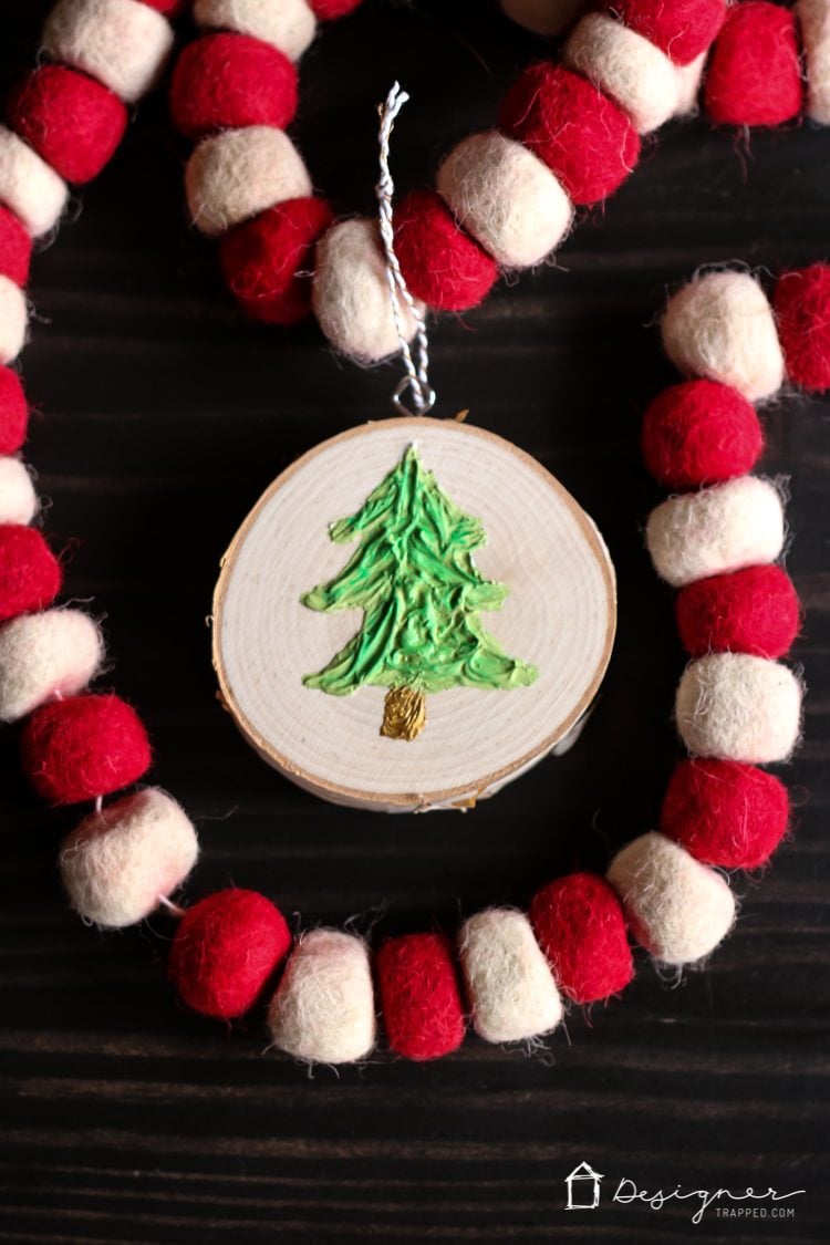 If you've ever wondered how to make Christmas ornaments that are unique and easy, this is the tutorial for you! I love how much texture the Christmas tree has--I never would have thought to use caulk!