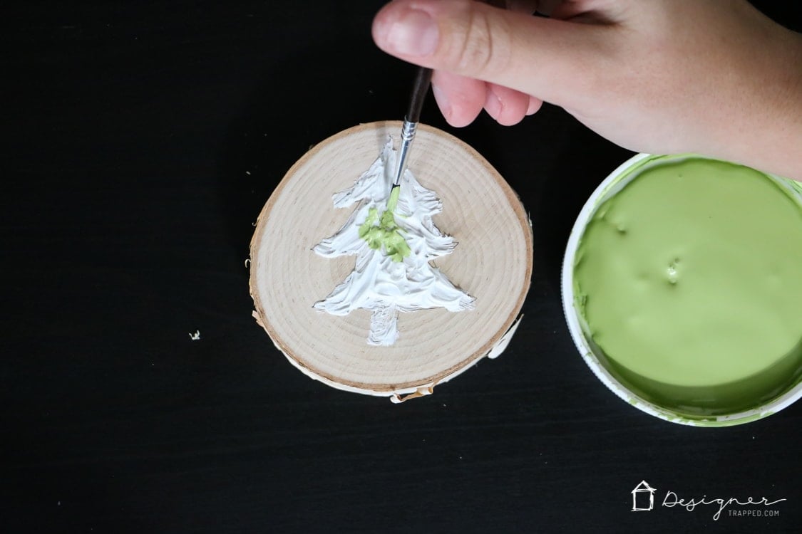 If you've ever wondered how to make Christmas ornaments that are unique and easy, this is the tutorial for you! I love how much texture the Christmas tree has--I never would have thought to use caulk!