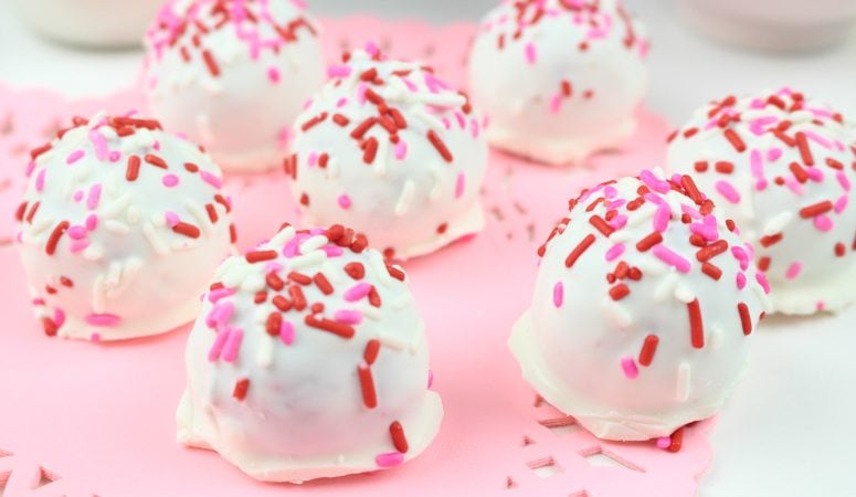 YUM! A Red Velvet twist on classic Oreo cookie balls. So excited to try this recipe for Oreo truffles this Valentine's Day! I love red velvet desserts and Oreo cookie balls. Win, win.
