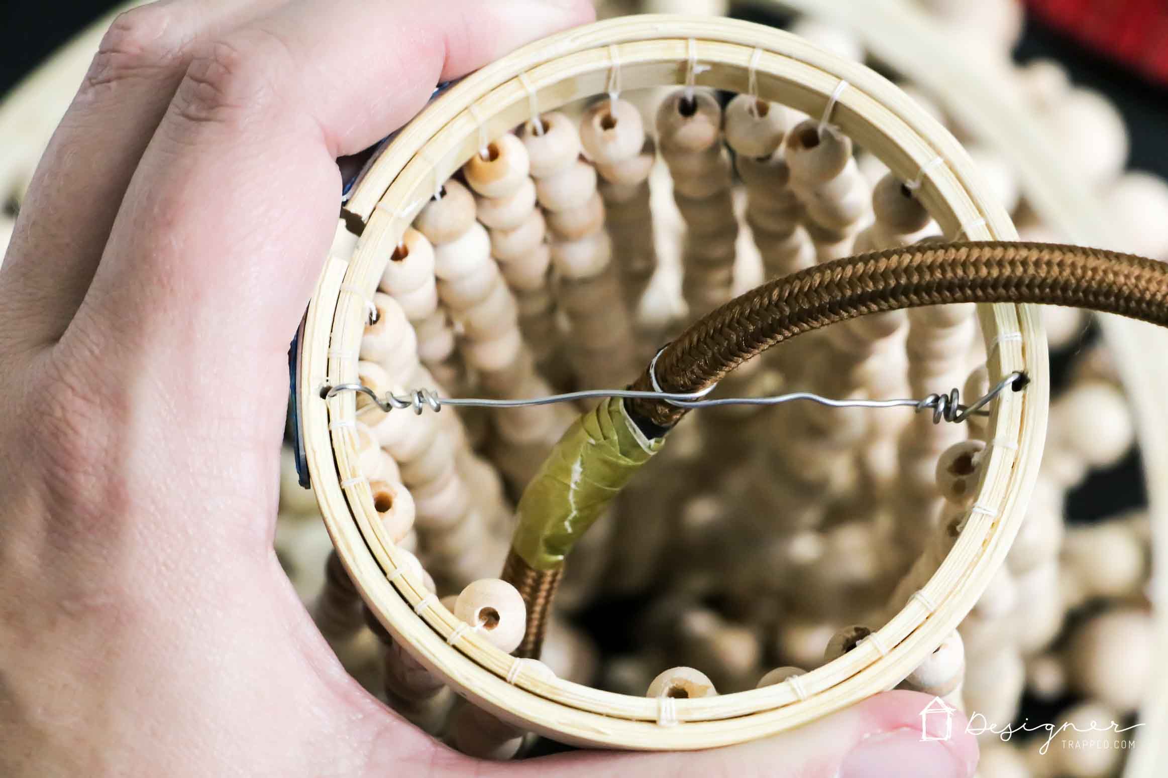 OMG, I love this DIY chandelier made from wood beads. It looks like it may take a while, but it doesn't look hard! I've wanted a wood bead chandelier but they are so expensive. Totally making this.