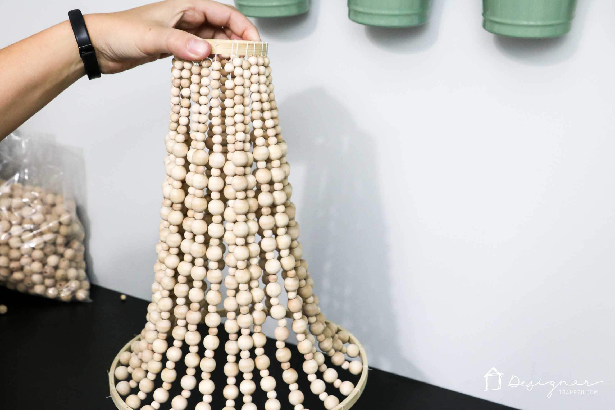 DIY wood bead chandelier in progress