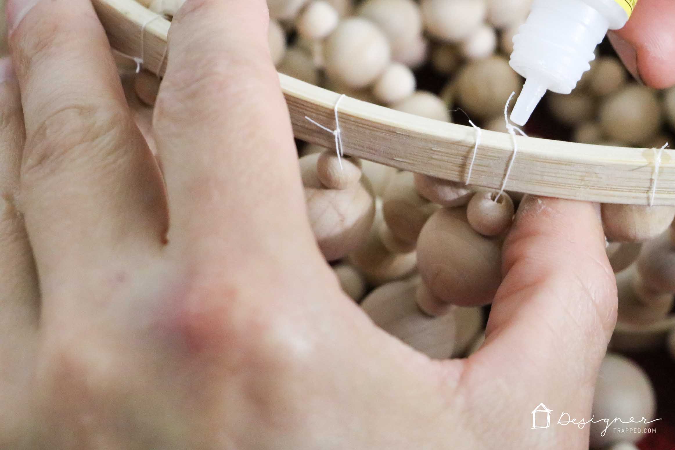 OMG, I love this DIY chandelier made from wood beads. It looks like it may take a while, but it doesn't look hard! I've wanted a wood bead chandelier but they are so expensive. Totally making this.