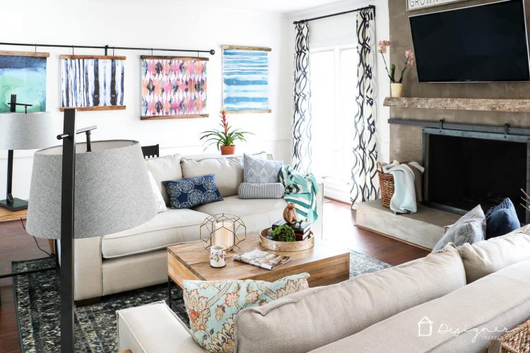 LOVE this family room design! Such a great way to combine a playroom and family room the whole family can enjoy into one space. Super smart interior design style choices! #spon