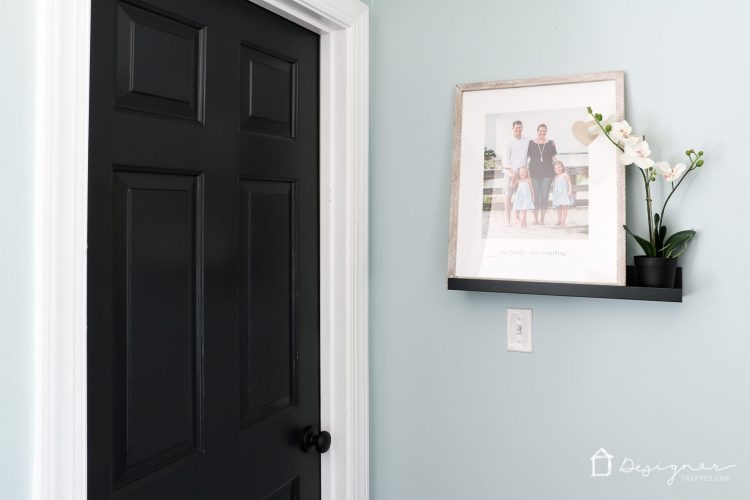 Love the idea of black interior doors for an affordable interior update! All you have to do is paint your doors black and update the hardware. HUGE impact!