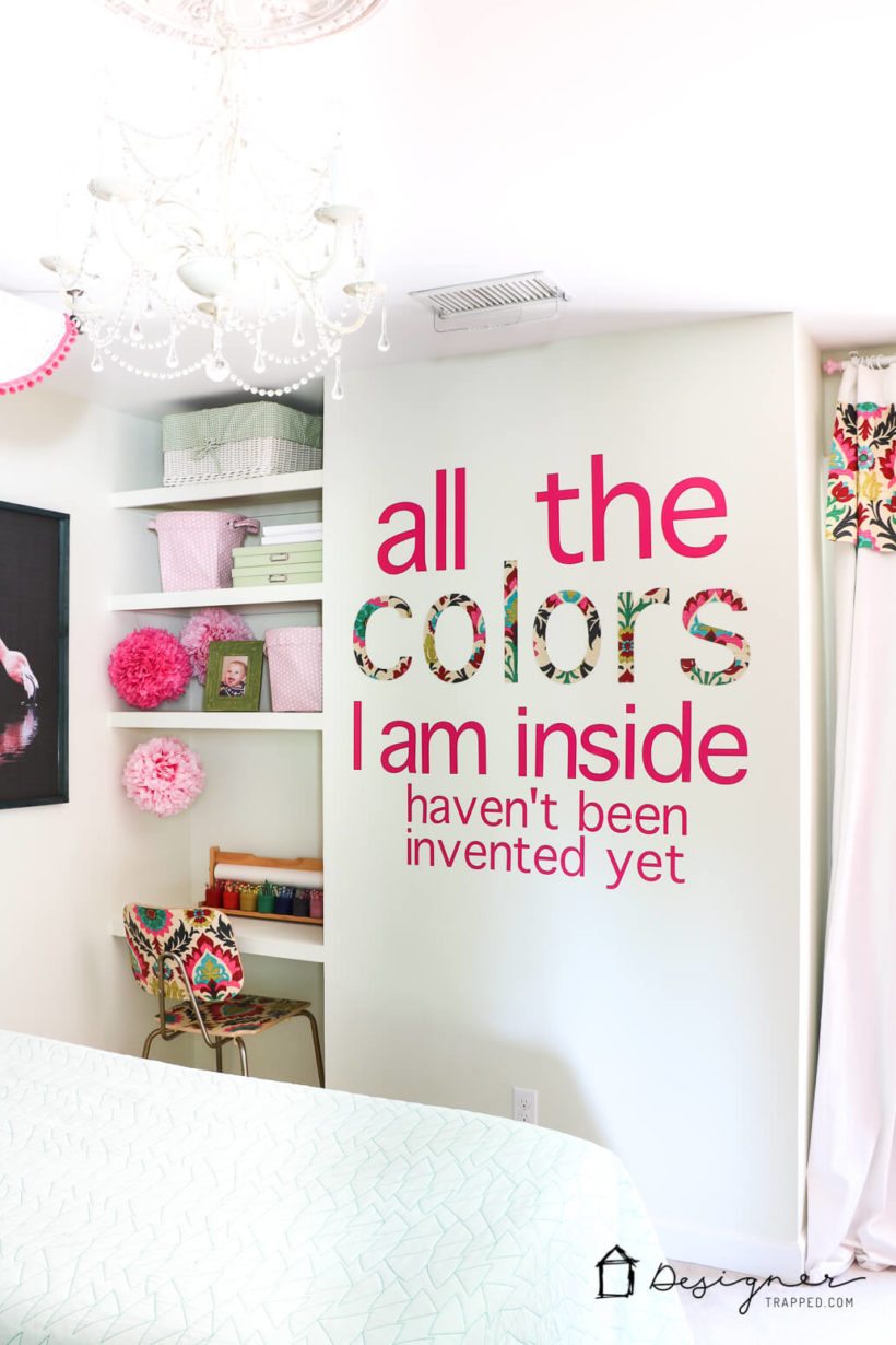 decoupaged wood chair in little girls' room with matching vinyl and decoupaged wall quote