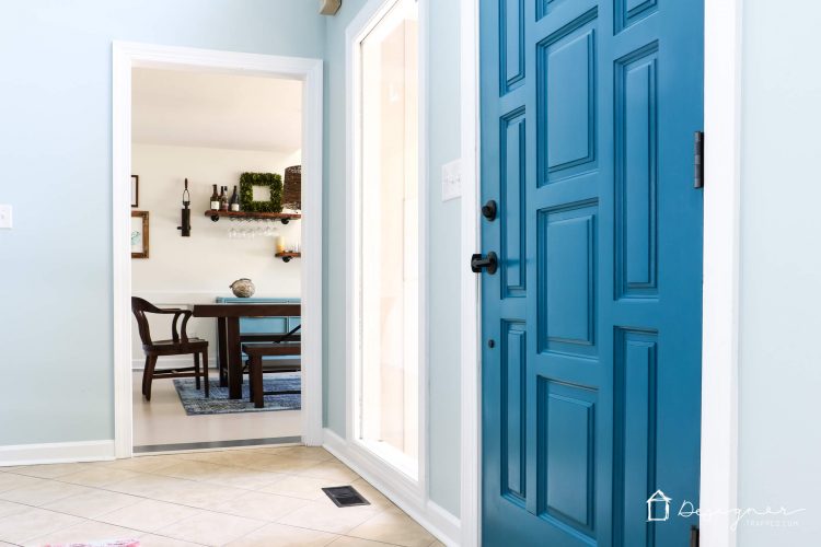 Never underestimate the impact of a simple front door update to increase your curb appeal! The bold color on this front door and the new hardware make it a total showstopper! #ad #CurbAppeal