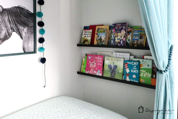 OMG, what kid wouldn't love this cozy bed nook?! Learn all about how to turn a closet into a bed nook by clicking through to the post. Spackling tips included :)