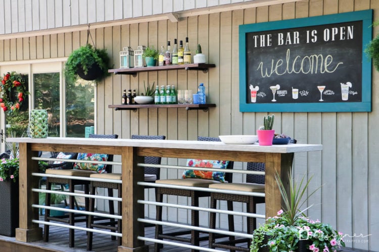 Dreaming of an outdoor bar or deck bar? We were too and we are sharing our plans for this easy and affordable DIY deck bar!