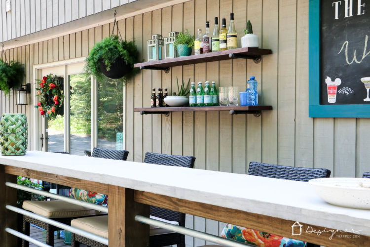 Dreaming of an outdoor bar or deck bar? We were too and we are sharing our plans for this easy and affordable DIY deck bar!