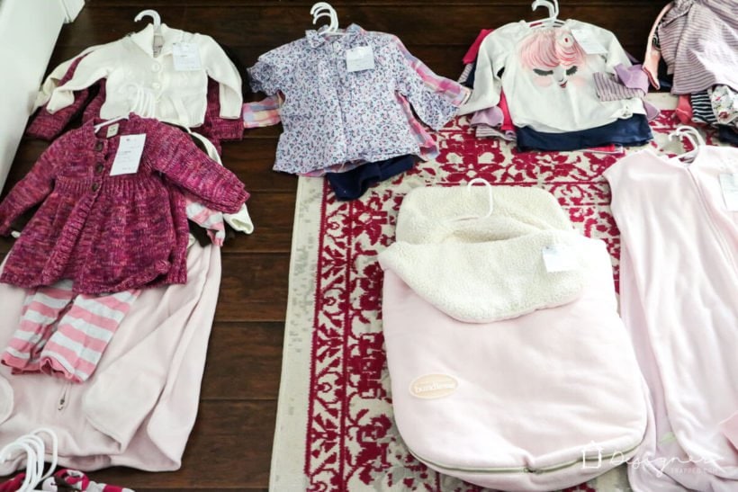 pricing baby items for consignment sale as part of decluttering home
