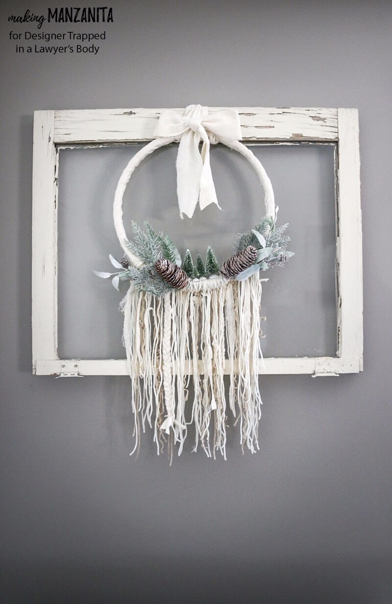 This DIY winter wreath is an easy way to add a touch of Winter beauty to your home! The Boho style of this winter wreath is so fun and different.