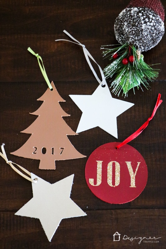 These handmade Christmas ornaments from leather are so unique and add a modern touch to any Christmas tree! Best of all, you can cut leather quickly and easily with the right tool!