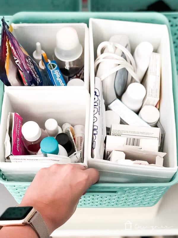 over the counter medications neatly stored in containers in bins