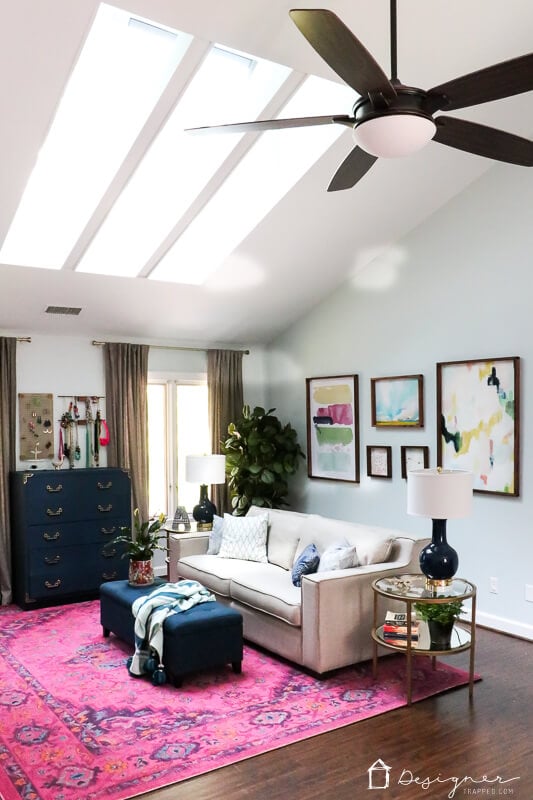 navy and pink sitting area in bedroom