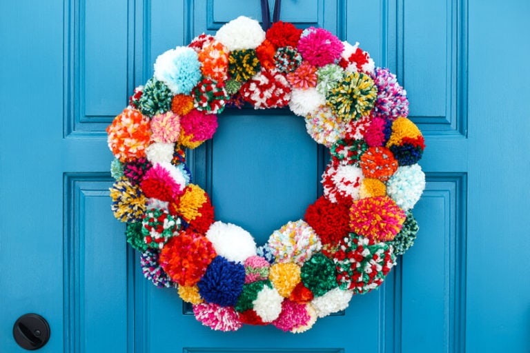 colorful diy pom pom wreath for fall or winter