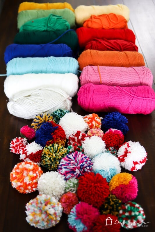 14 Homemade Blue Yarn Pom Poms