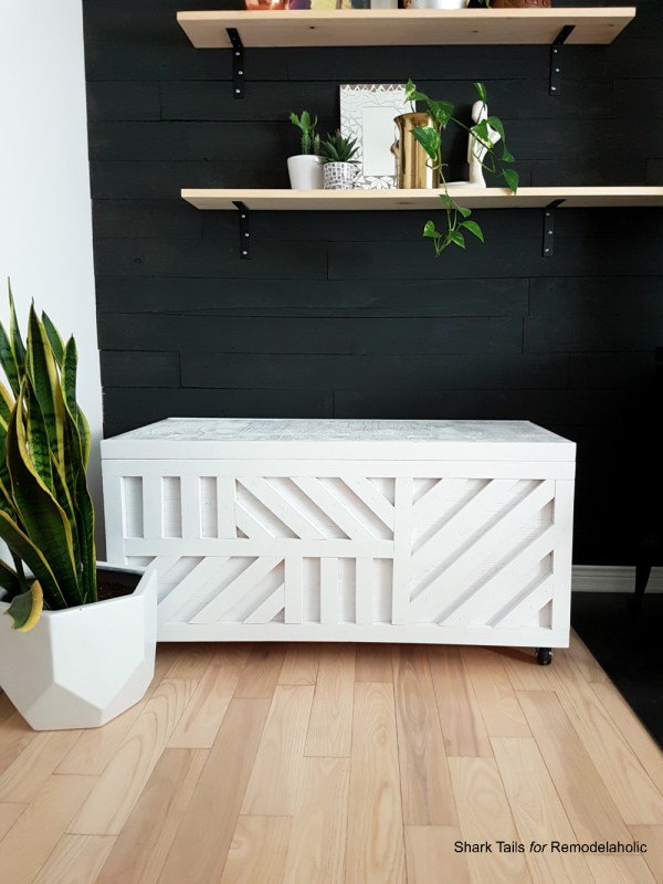 white storage bench with geometric inlay