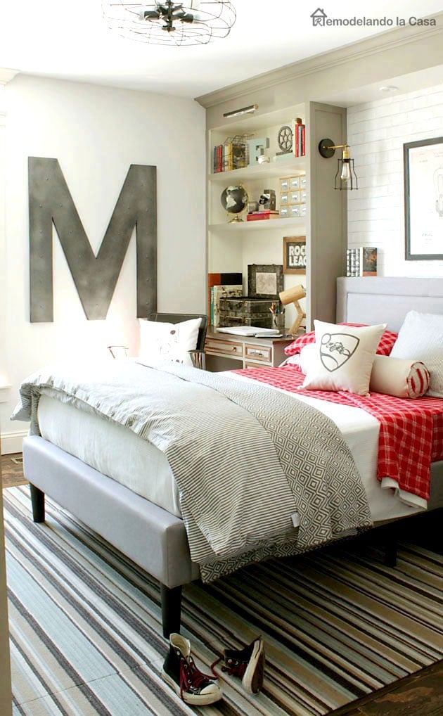 neutral boy room with pops of reds 