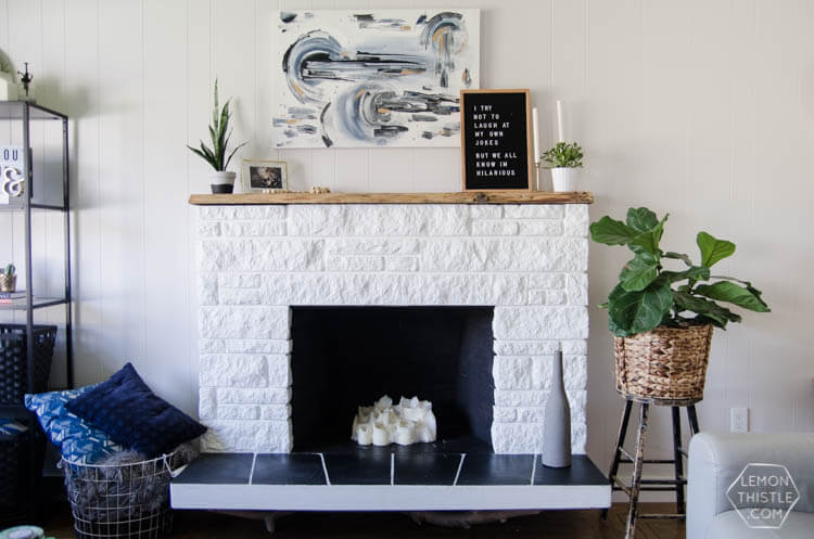 brick fireplace with live edge mantel