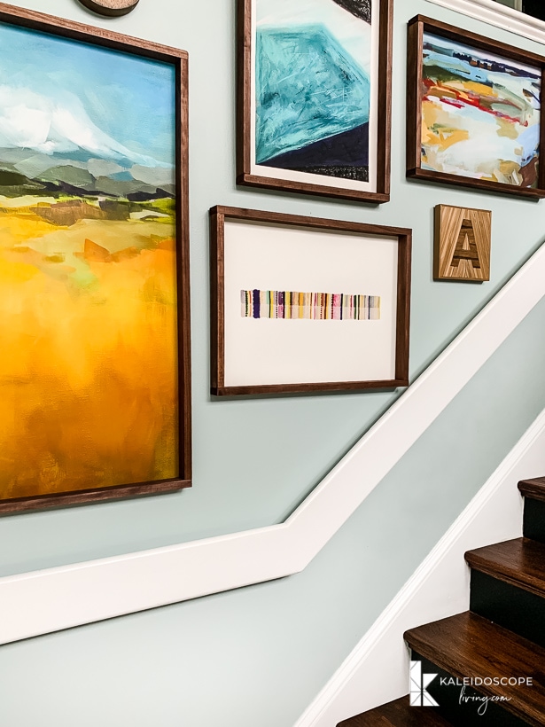 stairs with large DIY art frames