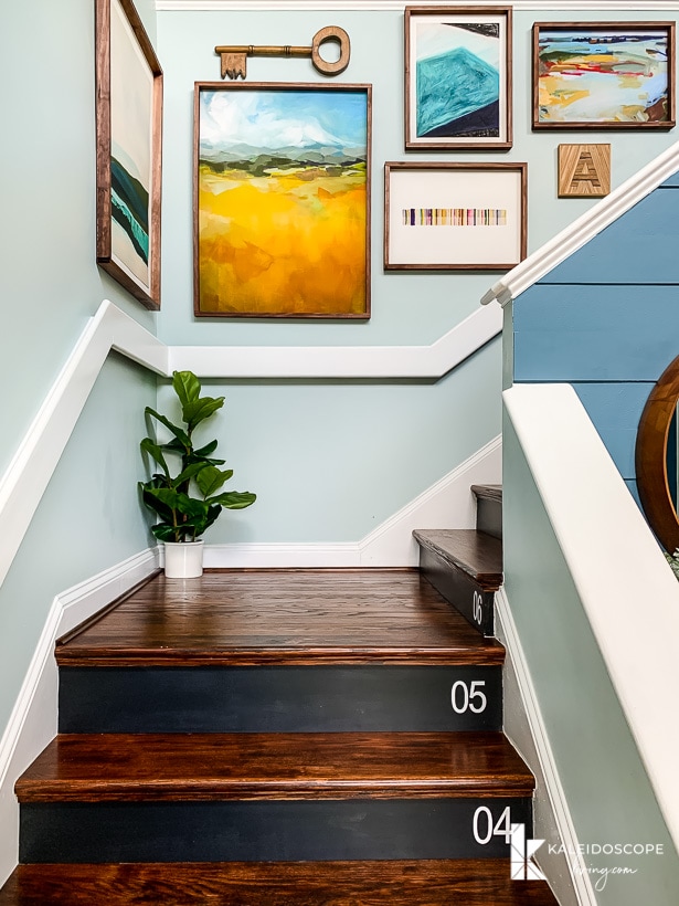 stairs with large DIY art frames