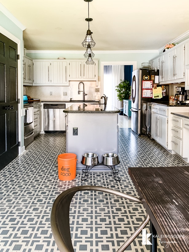 gray kitchen with painted and stenciled floors