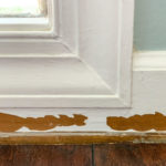 how to repair damaged baseboards photo with text overlay