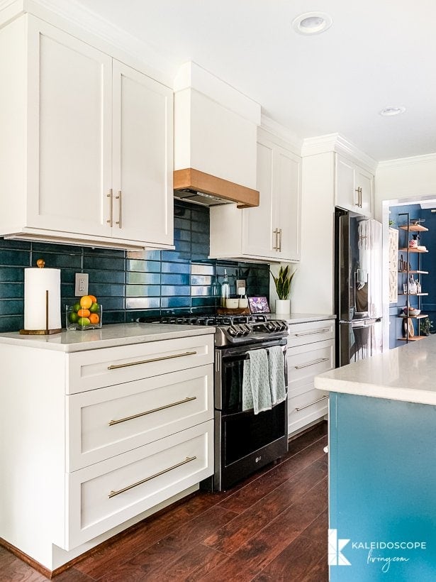 white and blue kitchen with diy range hood