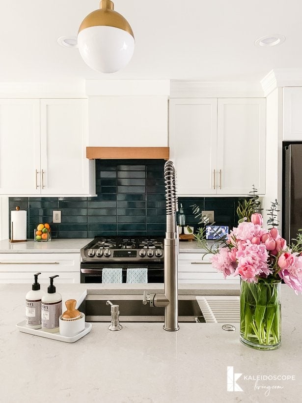 white and navy blue kitchen with DIY range hood