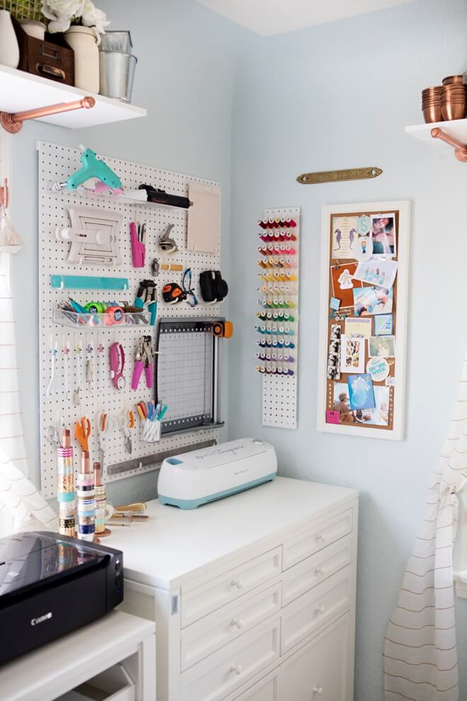 white craft room with bright pops