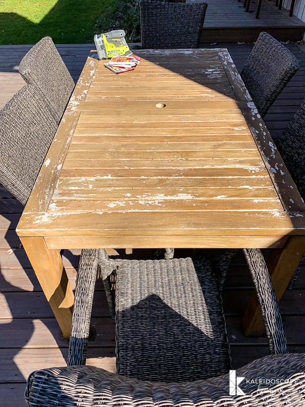 worn outdoor teak table