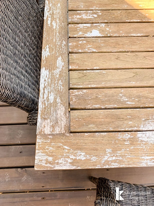 unevenly weathered teak outdoor table