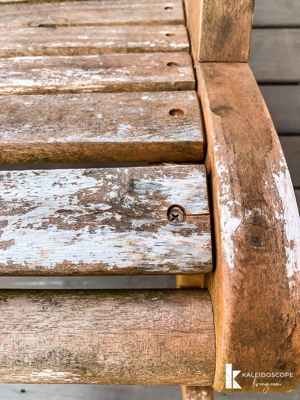 unevenly weathered outdoor acacia chair