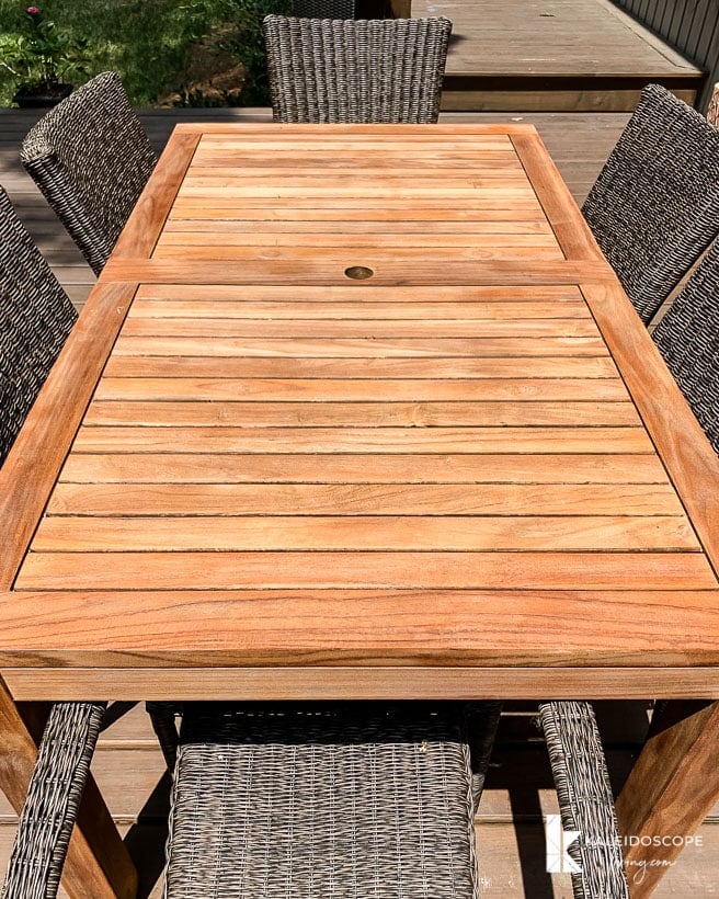 outdoor teak table after being restored