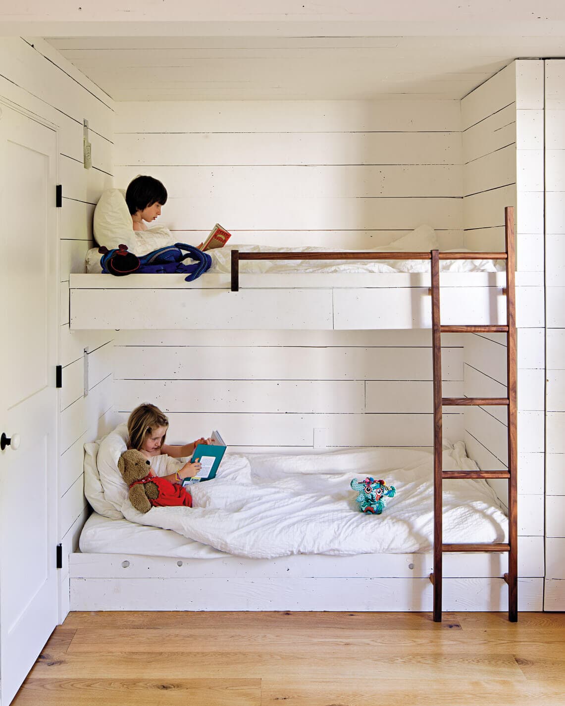 bunk beds and shiplap wall