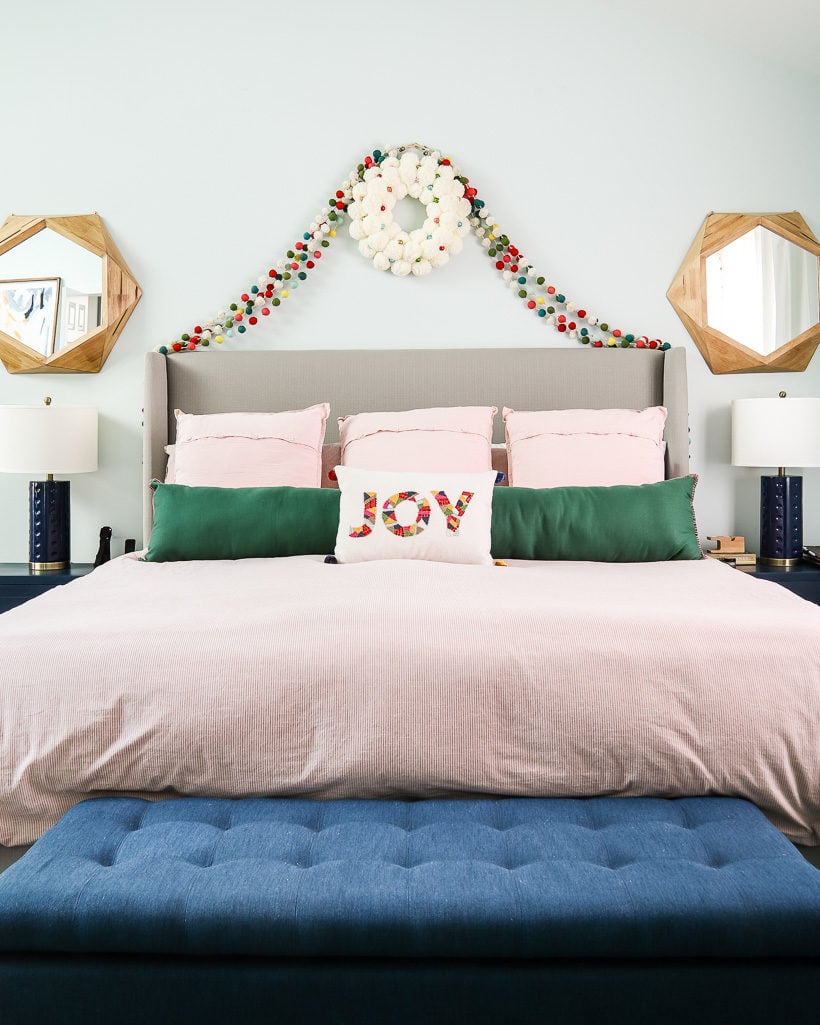 master bedroom with colorful christmas decorations