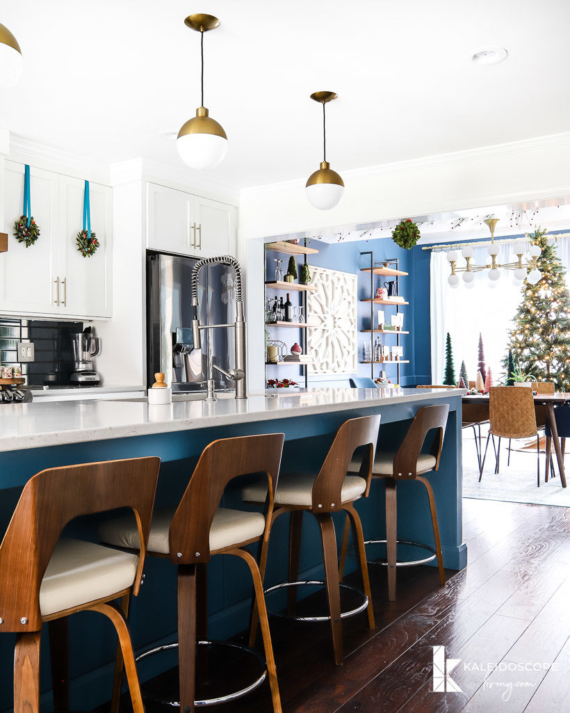 colorful christmas decorations in kitchen and dining room