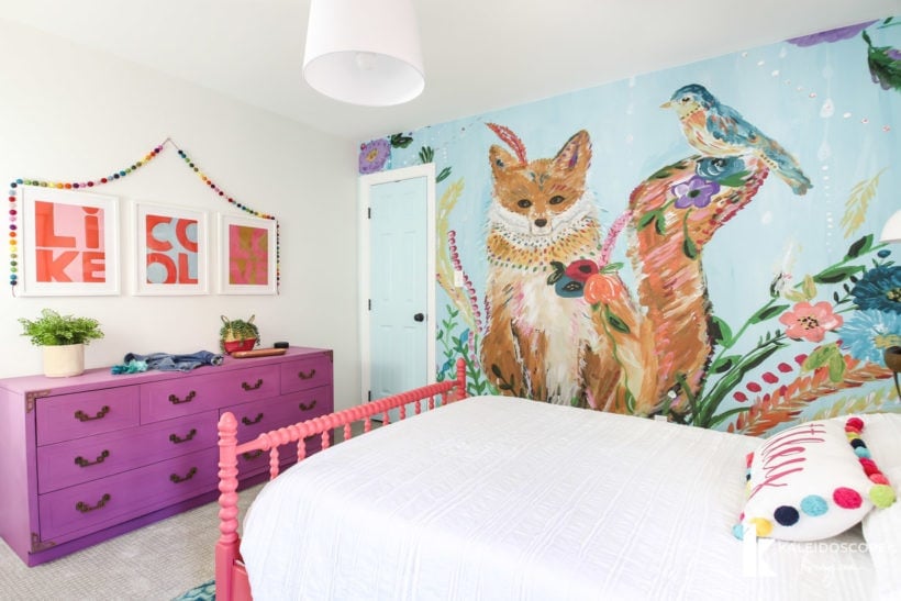 colorful girl's bedroom with wall mural