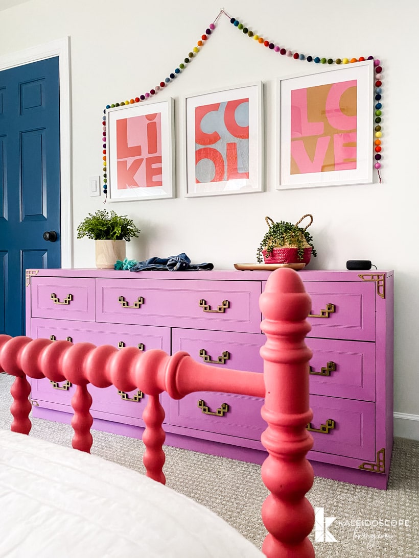 colorful girl's bedroom with purple dresser