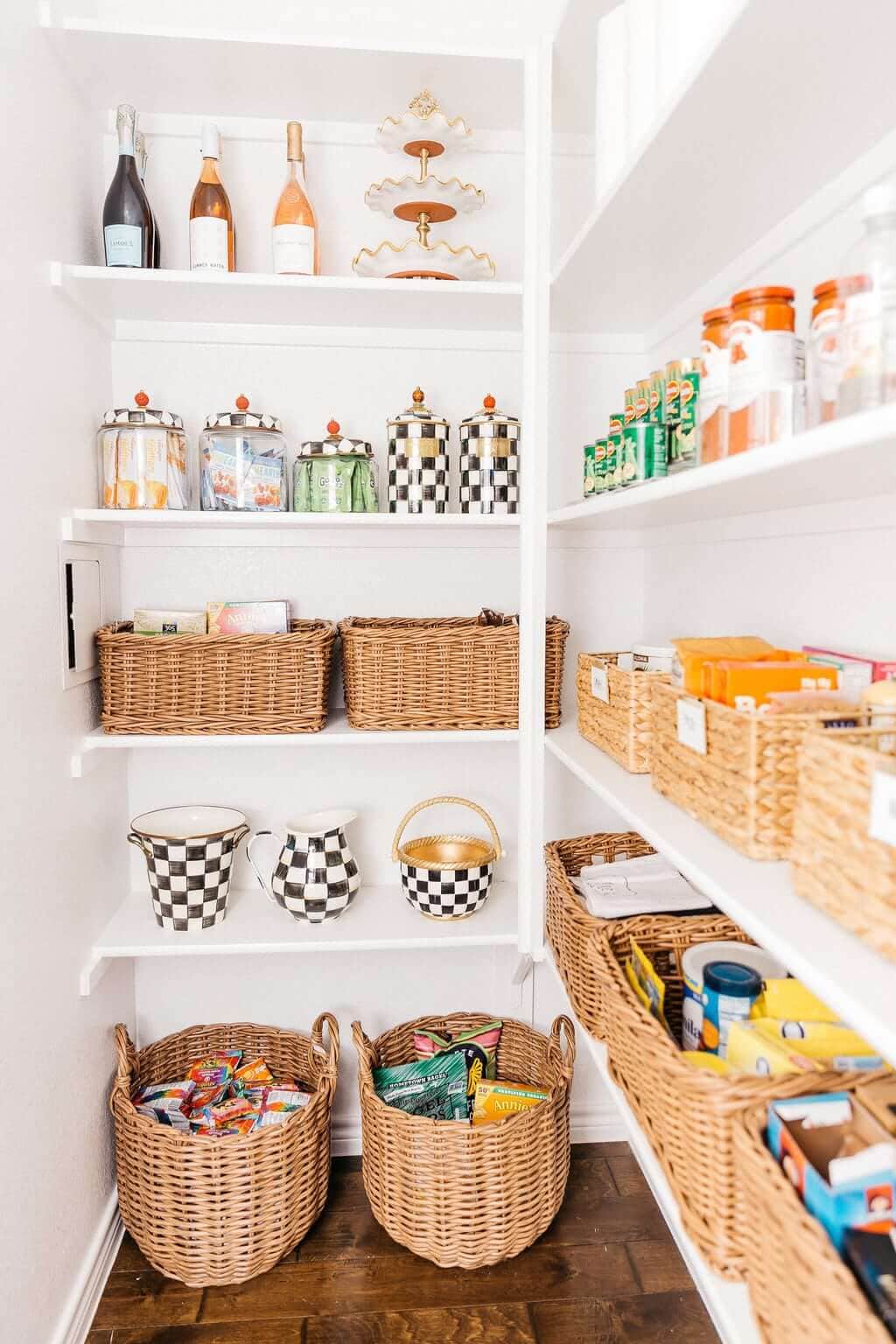 organized pantry with wicker baskets