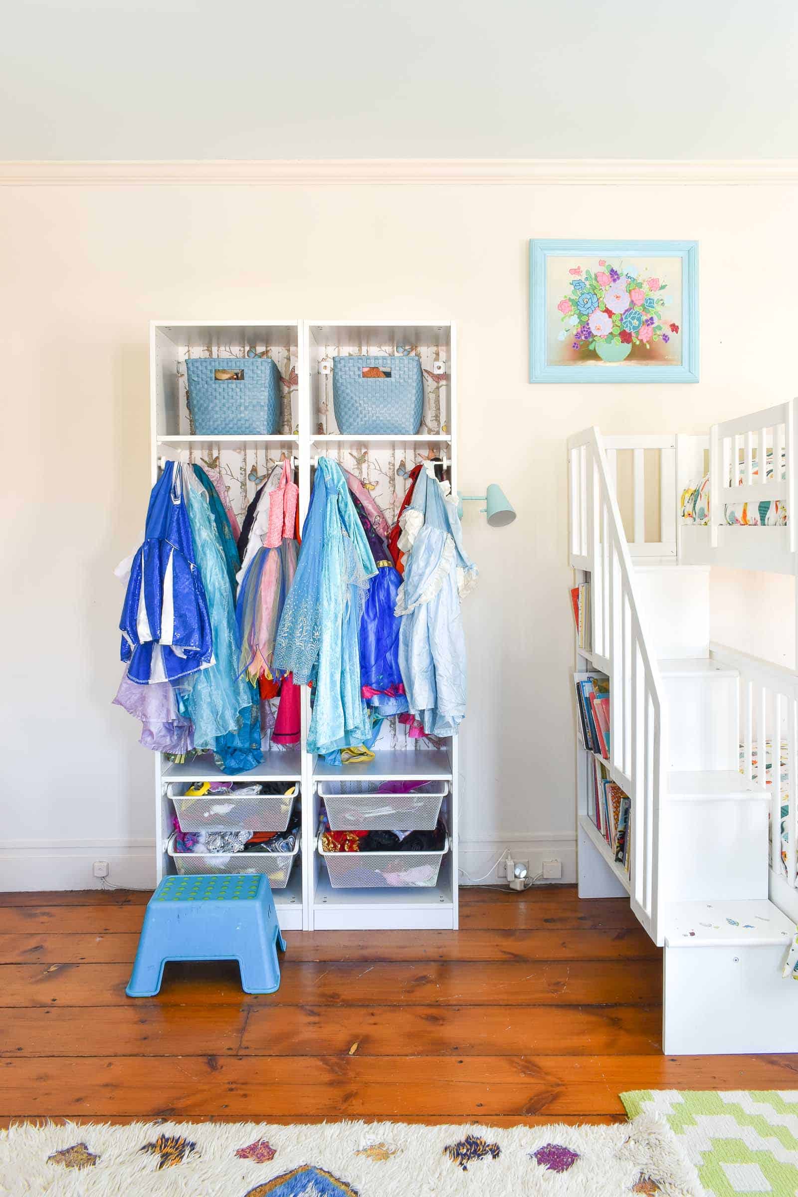 dress-up clothes storage in playroom