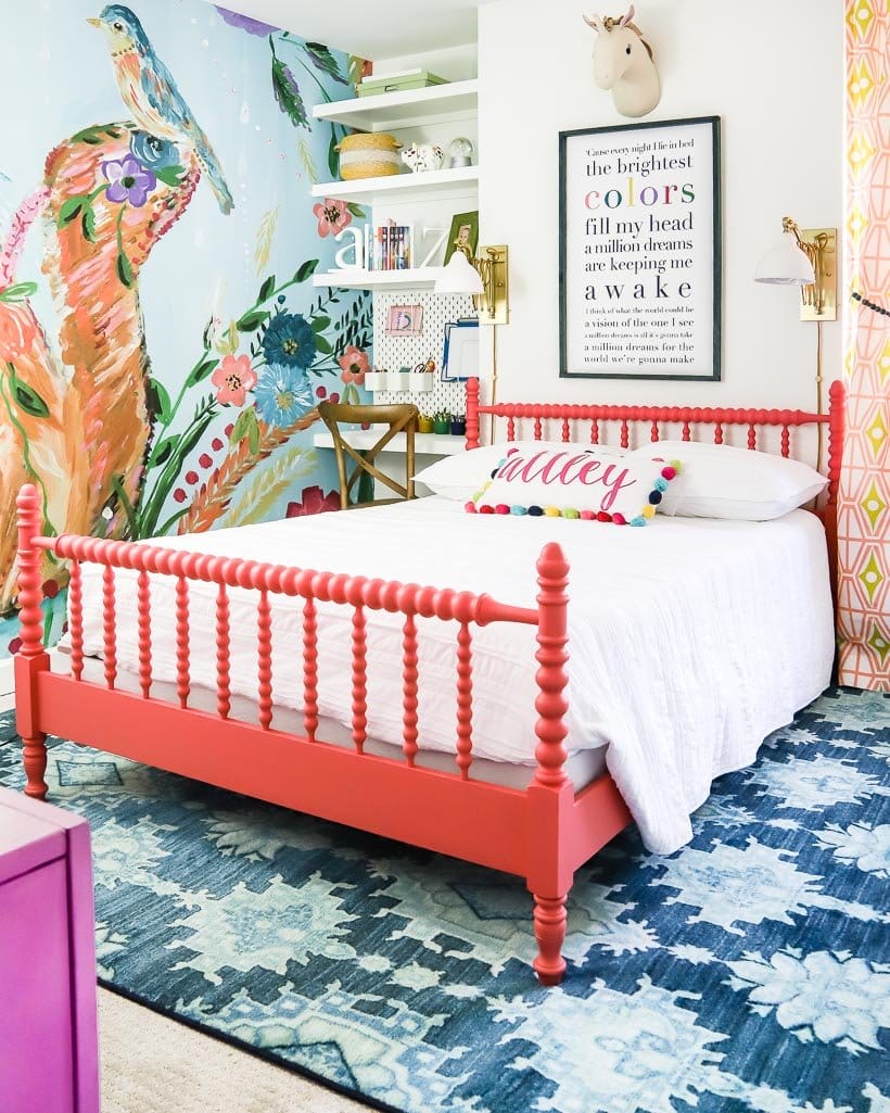 modern little girl room with colorful rug