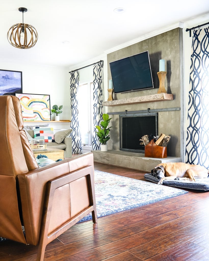 family room with concrete fireplace