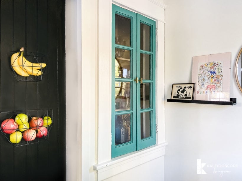 colorful cabinet and artwork in kitchen