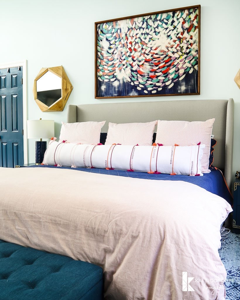 colorful wall art in master bedroom