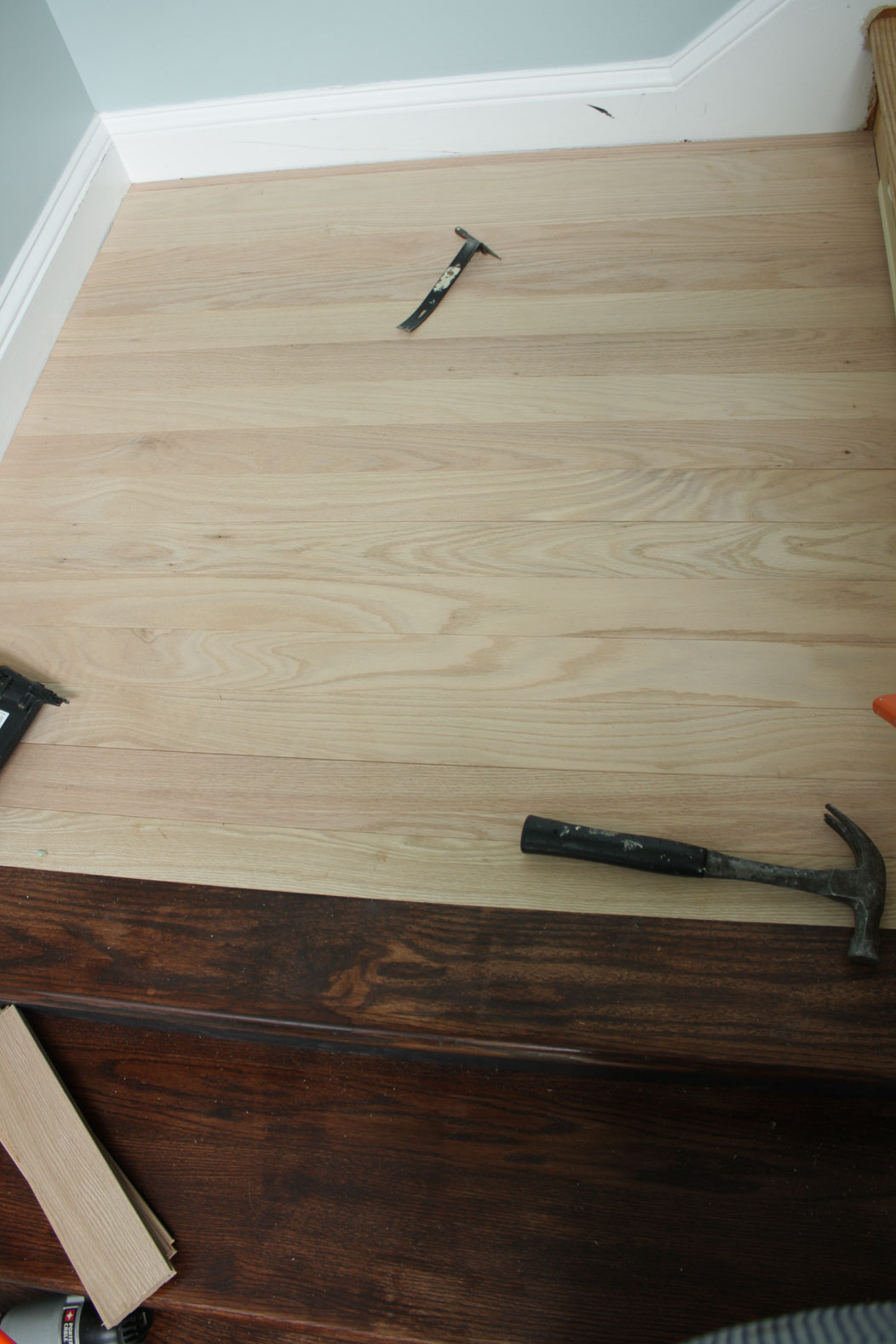 installing hardwood floors on stair landing