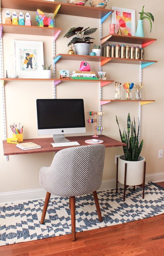 office made from wood shelving with bright brackets